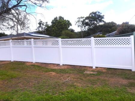 Bertha lattice-top privacy fence gallery with side access gate and raised entry by Queensland Fencing Specialists