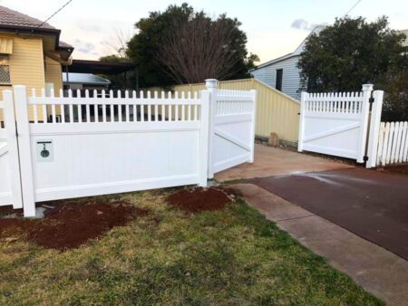 Eleanor picket-top privacy fence gallery with double driveway gates by Queensland Fencing Specialists